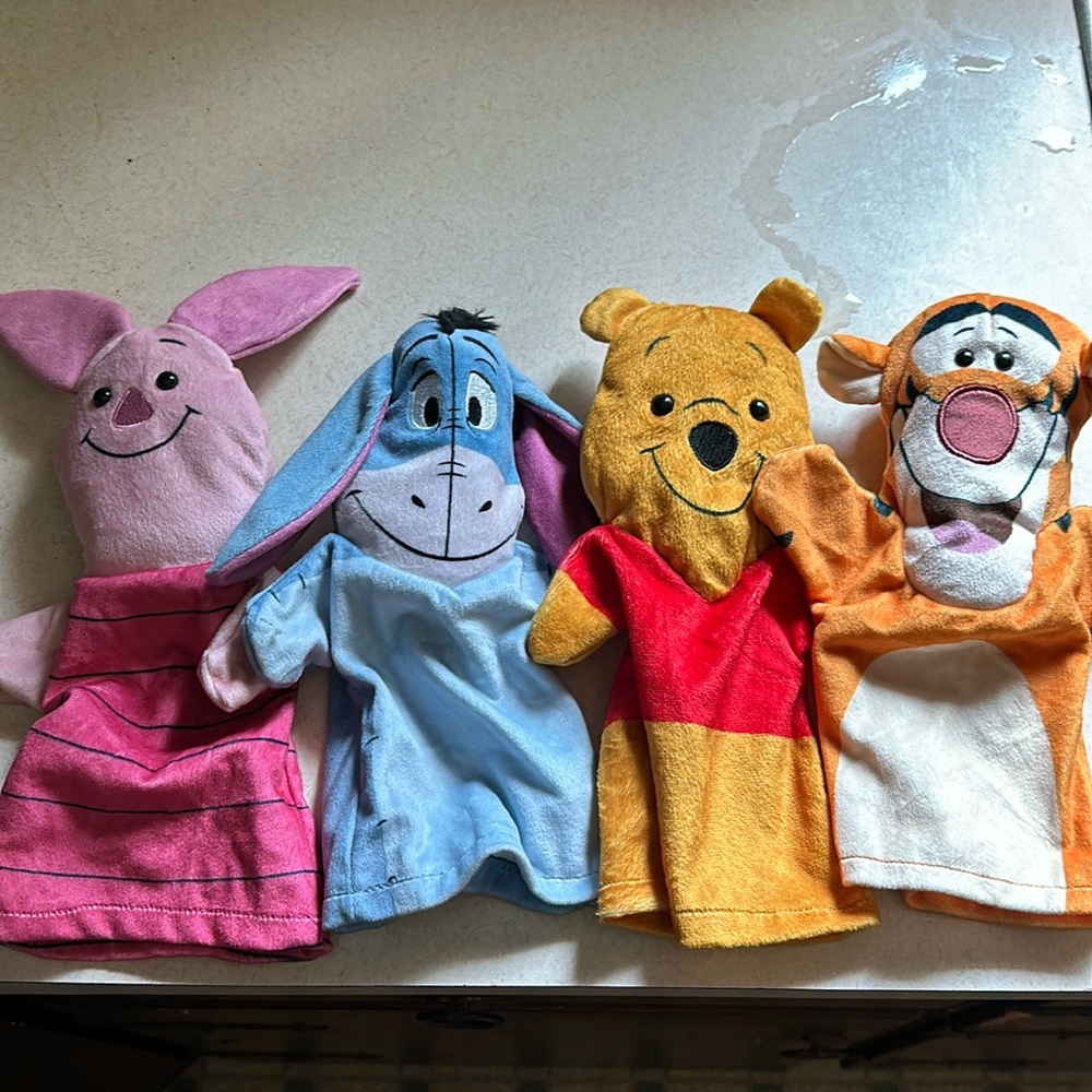 Winnie the Pooh hand puppets. Perfect condition. Sold as a pack of all 4 puppets